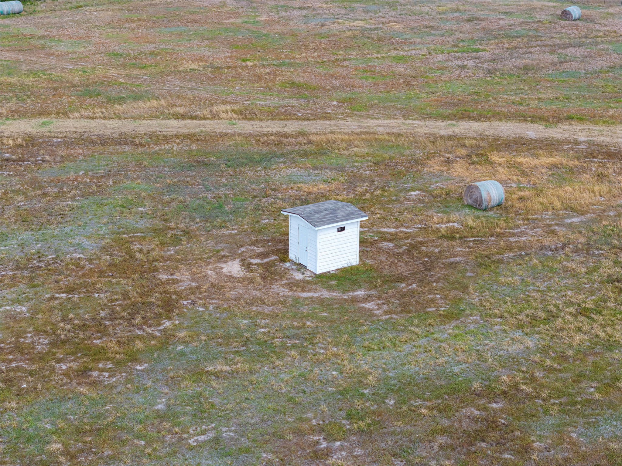 9690 Fm 1300 Road Louise, TX 77455 - Photo 8 of 11 a view of a dry yard with wooden floor