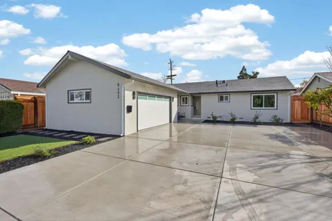 a house view with a backyard