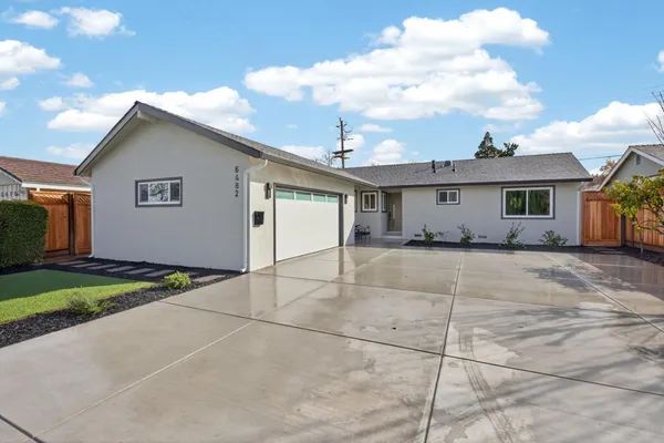 a house view with a backyard