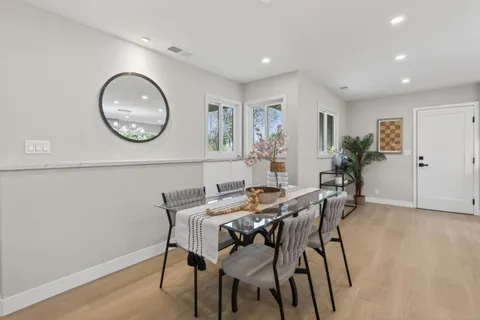 a view of a dining room with furniture