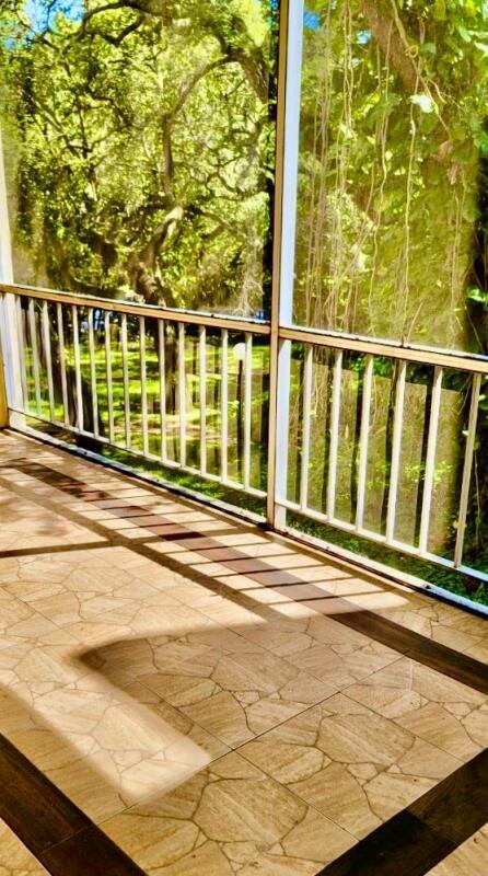 610 Northwest 13th Street, Unit 23 Boca Raton, FL 33486 - Photo 3 of 28 a view of a balcony