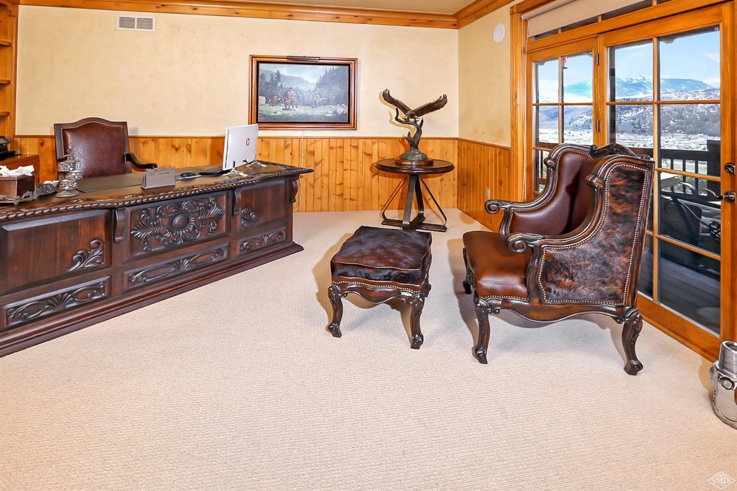 142 Spring Creek Lane Edwards, CO 81632 - Photo 12 of 25 a living room with furniture and a flat screen tv