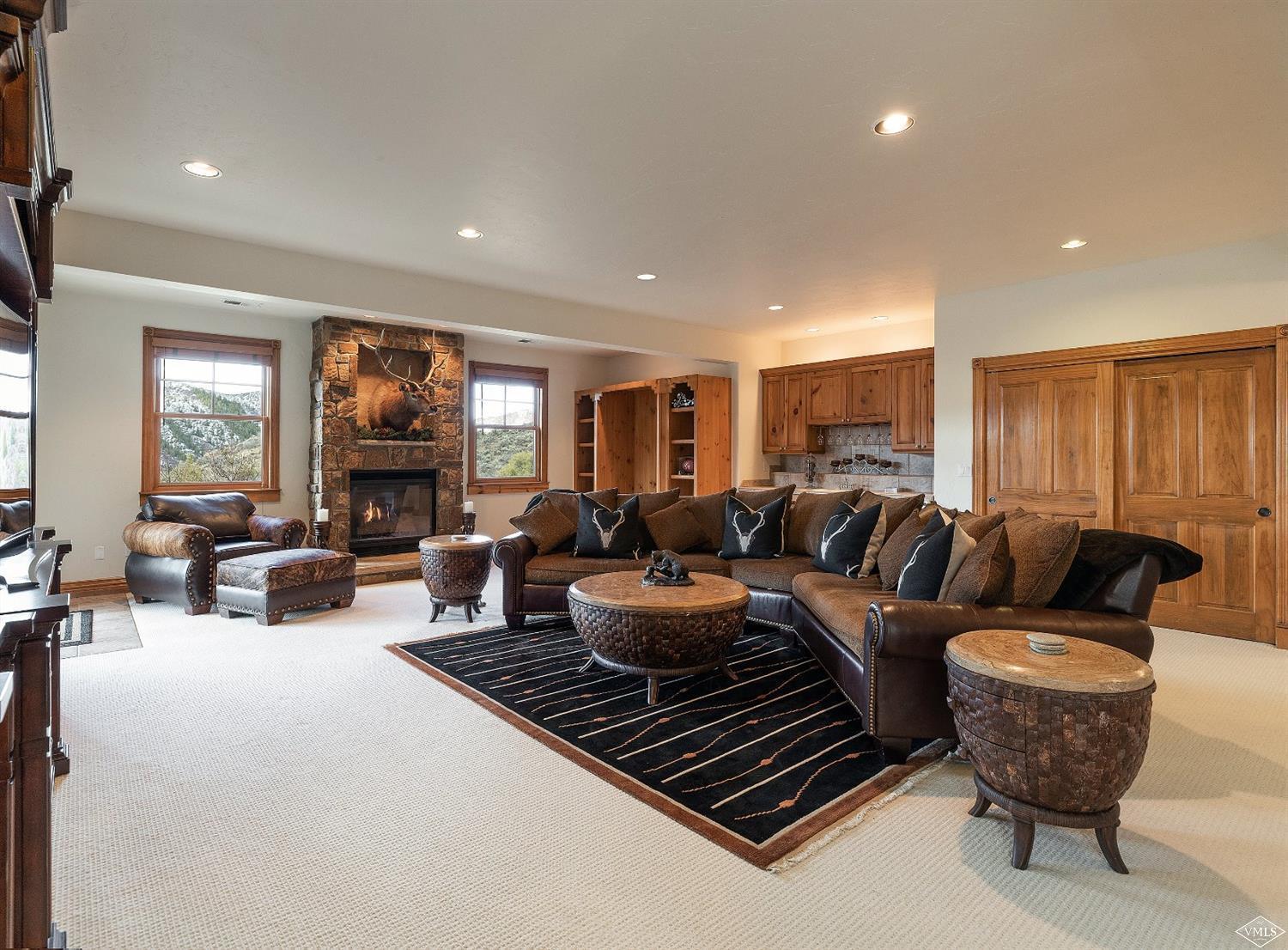 142 Spring Creek Lane Edwards, CO 81632 - Photo 13 of 25 a living room with furniture kitchen view and a large window
