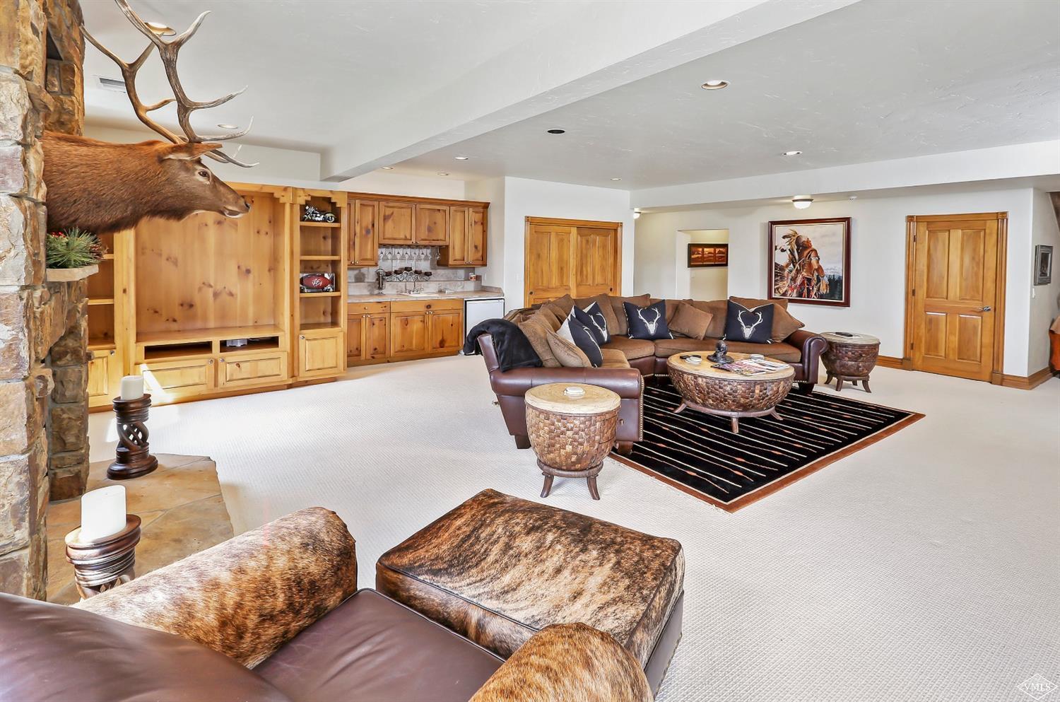 142 Spring Creek Lane Edwards, CO 81632 - Photo 14 of 25 a living room with furniture and a wooden floor