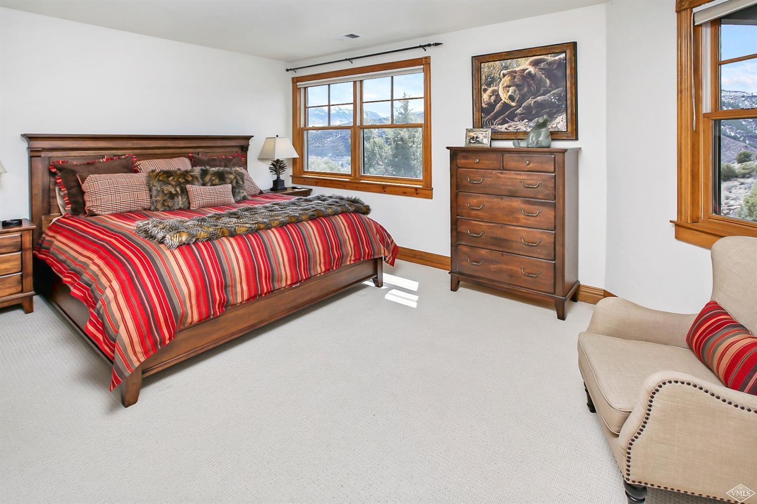 142 Spring Creek Lane Edwards, CO 81632 - Photo 15 of 25 a bedroom with furniture and windows