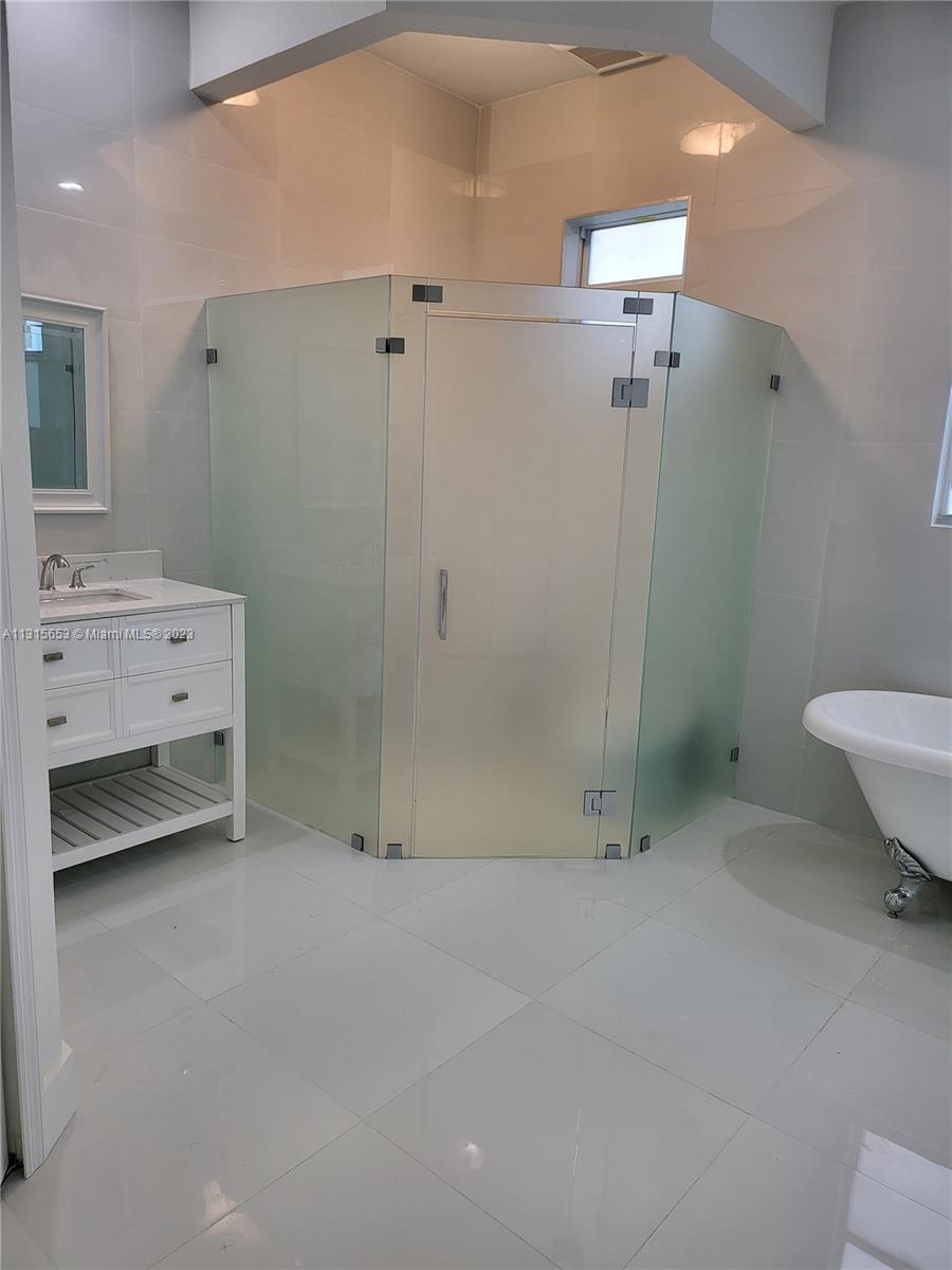 Goulds Miami, FL 33170 - Photo 4 of 5 a bathroom with a sink a toilet and shower