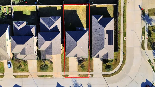 an aerial view of a house with garden