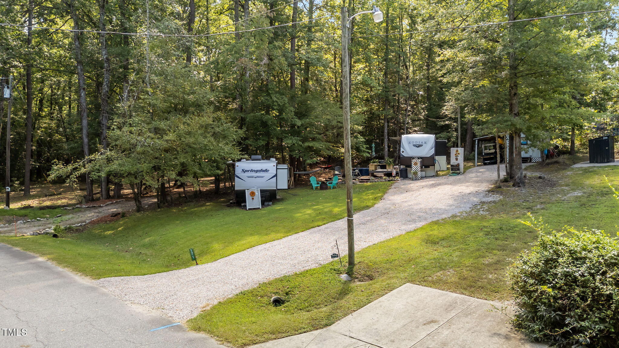 171 Winnebago Loop Louisburg, NC 27549 - Photo 2 of 32 a view of a garden with a slide