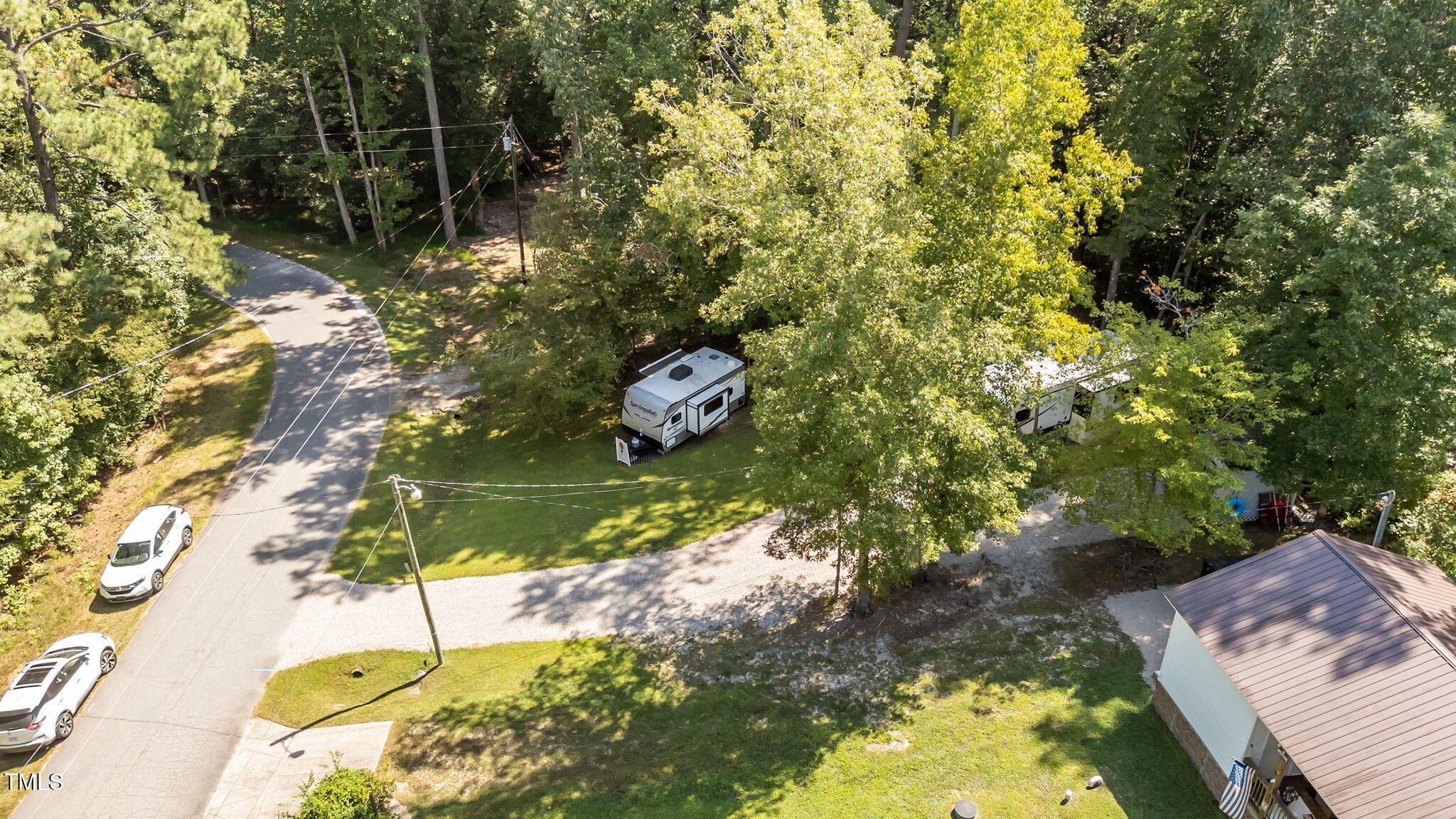 171 Winnebago Loop Louisburg, NC 27549 - Photo 3 of 32 a view of lake from a house