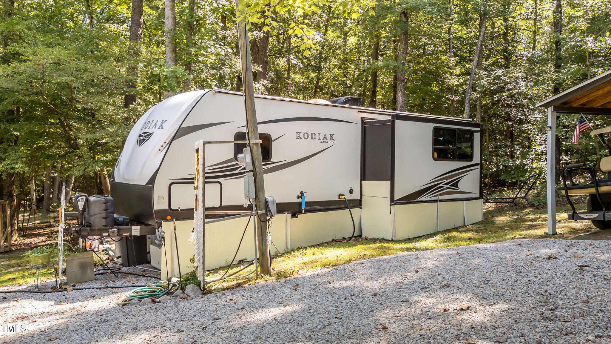 171 Winnebago Loop Louisburg, NC 27549 - Photo 5 of 32 a view of a house with a backyard