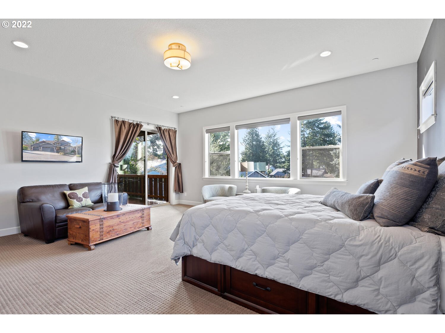 6117 Southwest 67th Place Portland, OR 97223 - Photo 14 of 32 a bedroom with a bed and window