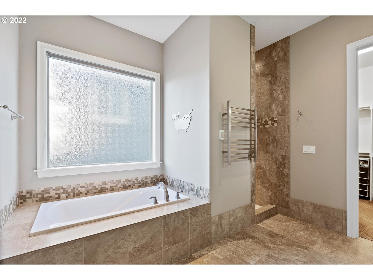 6117 Southwest 67th Place Portland, OR 97223 - Photo 16 of 32 a bathroom with a bathtub and a shower