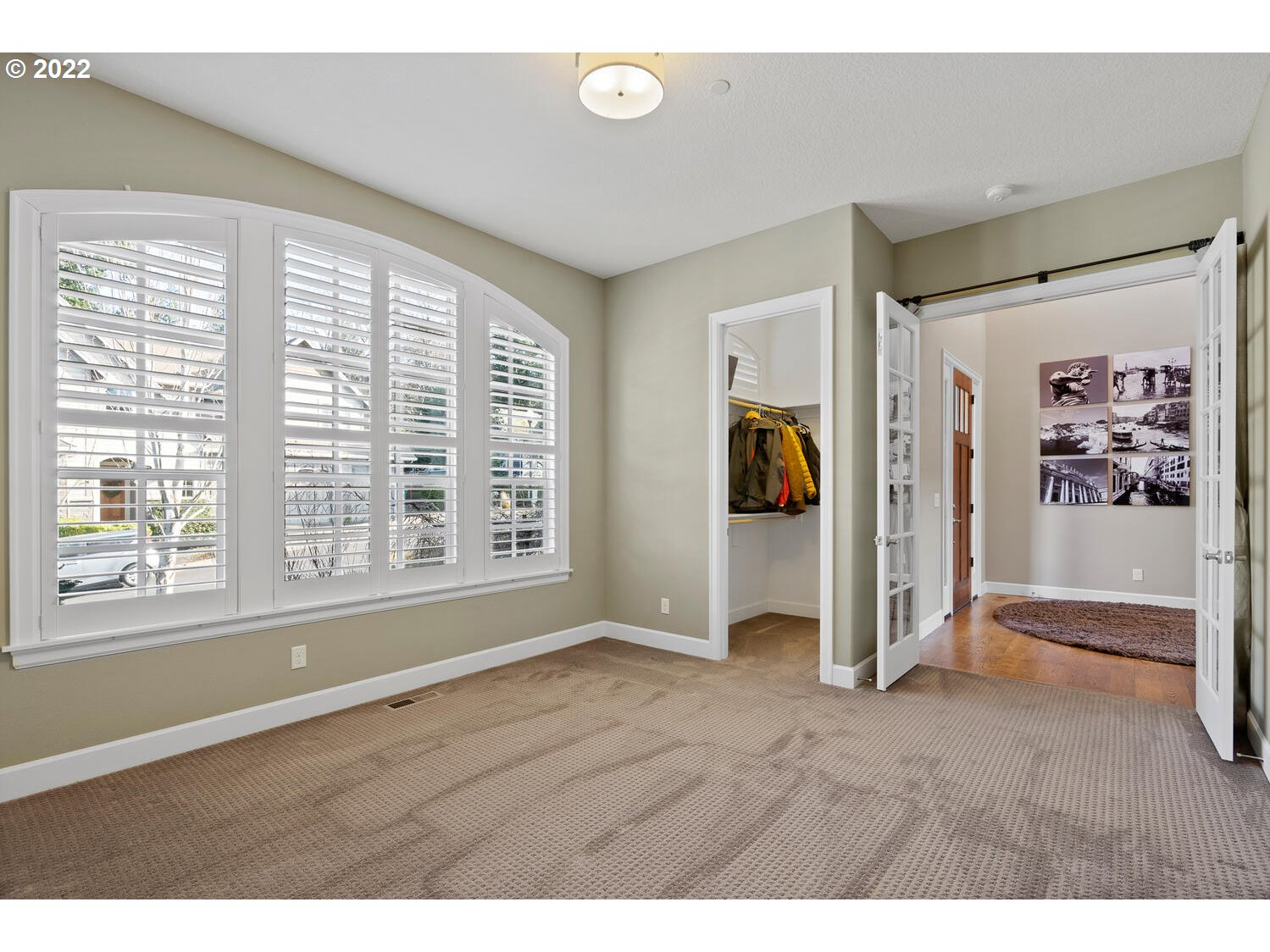 6117 Southwest 67th Place Portland, OR 97223 - Photo 19 of 32 a view of livingroom with hardwood floor and window