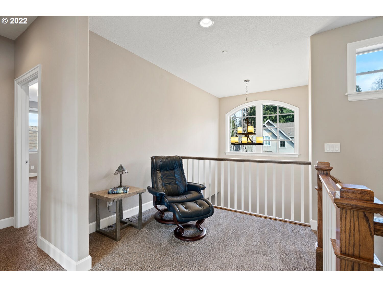 6117 Southwest 67th Place Portland, OR 97223 - Photo 23 of 32 a living room with furniture a flat screen tv and a window