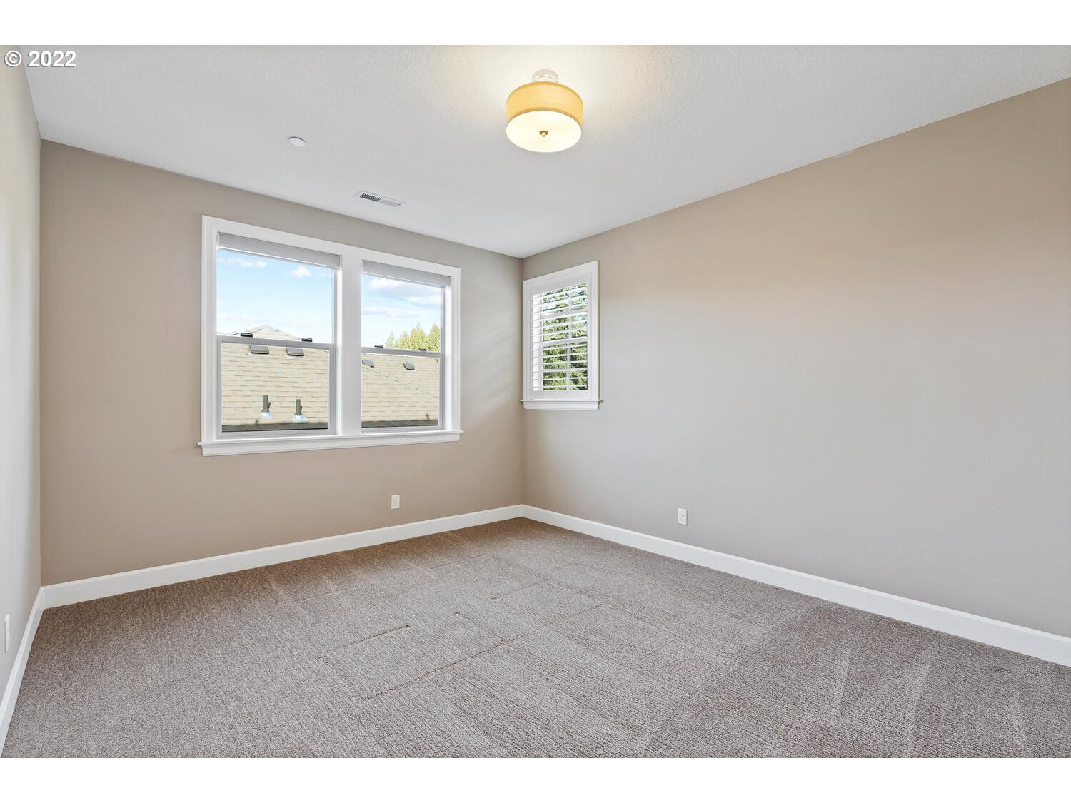 6117 Southwest 67th Place Portland, OR 97223 - Photo 24 of 32 a view of an empty room with a window