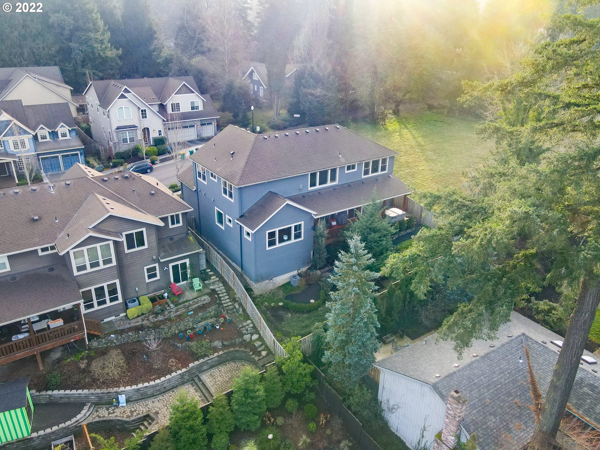 6117 Southwest 67th Place Portland, OR 97223 - Photo 31 of 32 an aerial view of a house with a yard