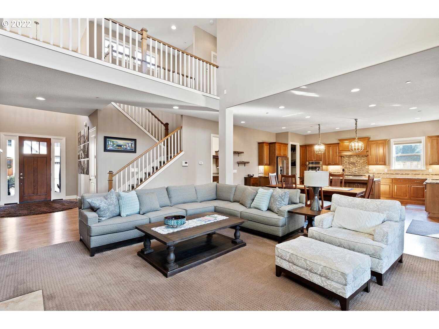 6117 Southwest 67th Place Portland, OR 97223 - Photo 7 of 32 a living room with furniture and a wooden floor