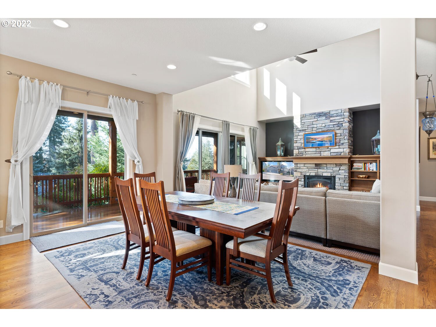 6117 Southwest 67th Place Portland, OR 97223 - Photo 9 of 32 a dining room with furniture and wooden floor