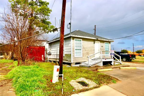 a front view of a house with swimming pool