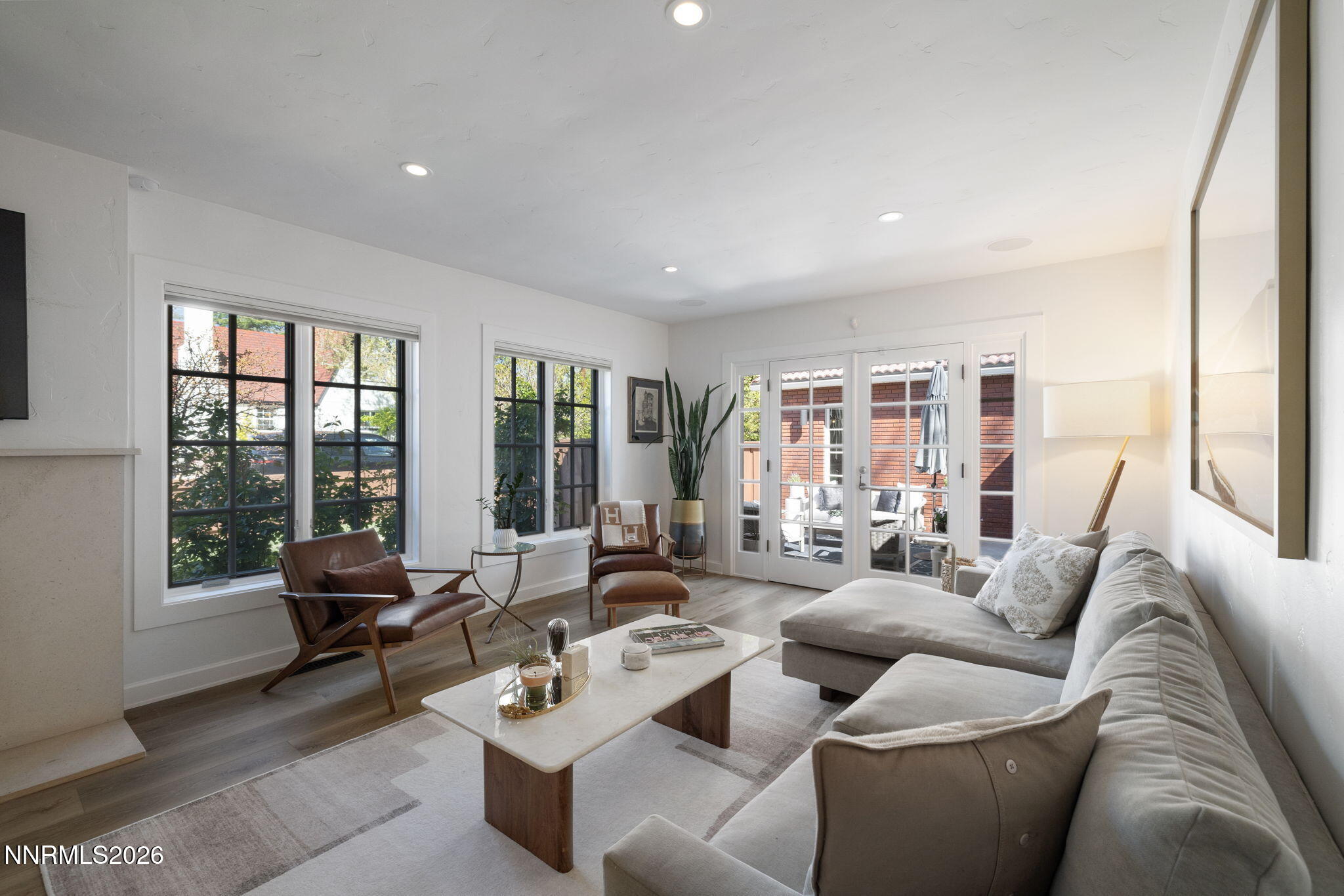 210 Bret Harte Avenue Reno, NV 89509 - Photo 5 of 40 a living room with furniture and a large window