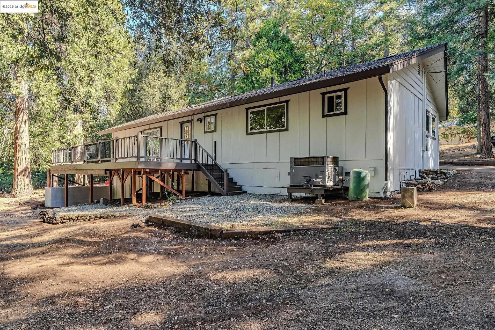 23656 Lightning Pioneer, CA 95666 - Photo 25 of 32 a view of a house with backyard and sitting area