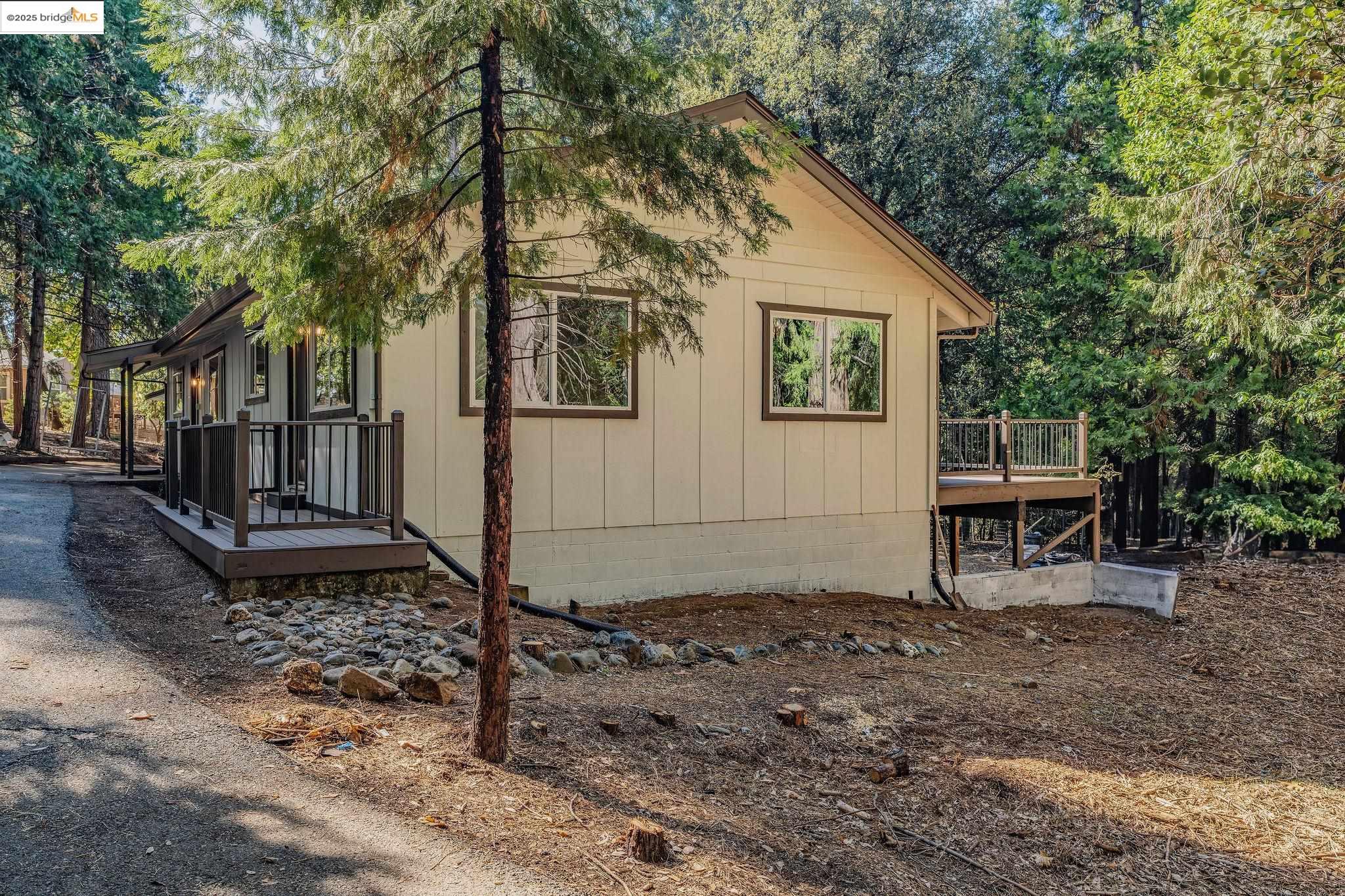 23656 Lightning Pioneer, CA 95666 - Photo 26 of 32 a view of a house with a yard