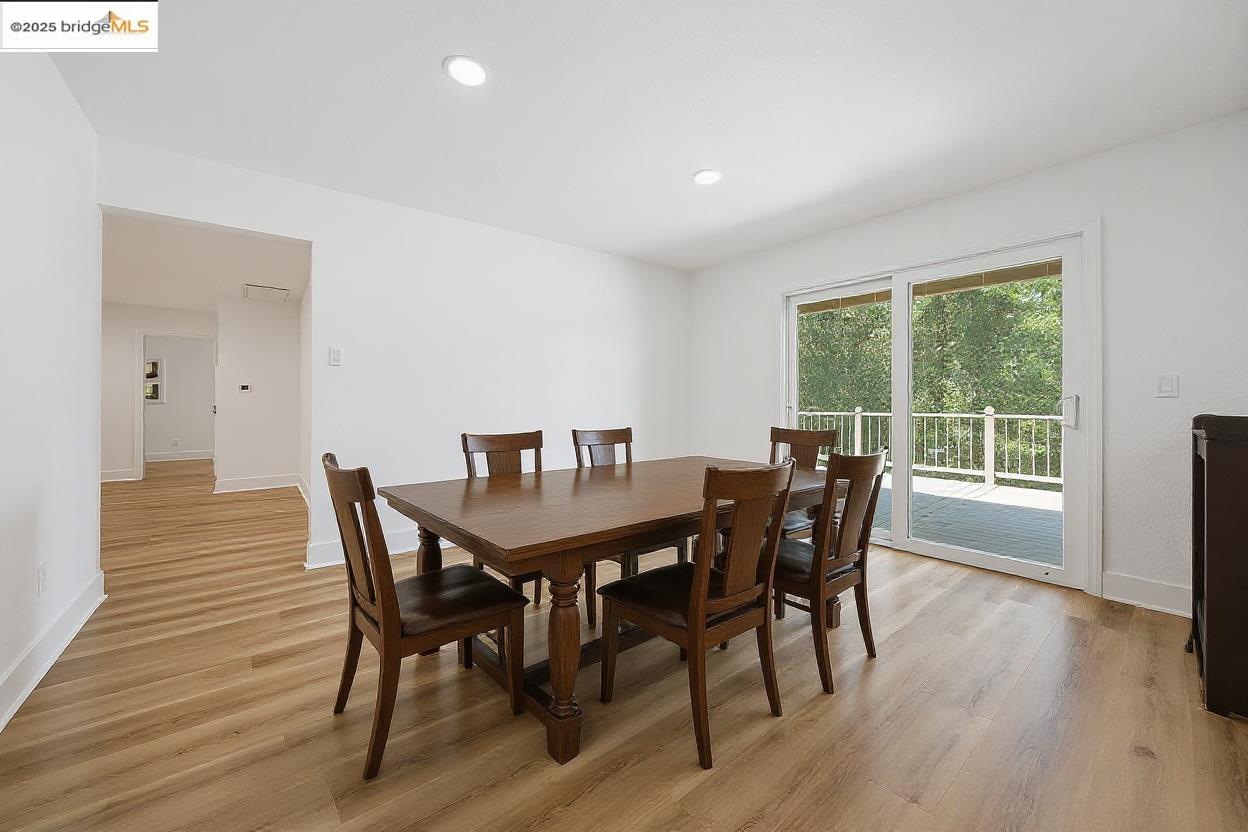 23656 Lightning Pioneer, CA 95666 - Photo 4 of 32 a view of a dining room with furniture and wooden floor