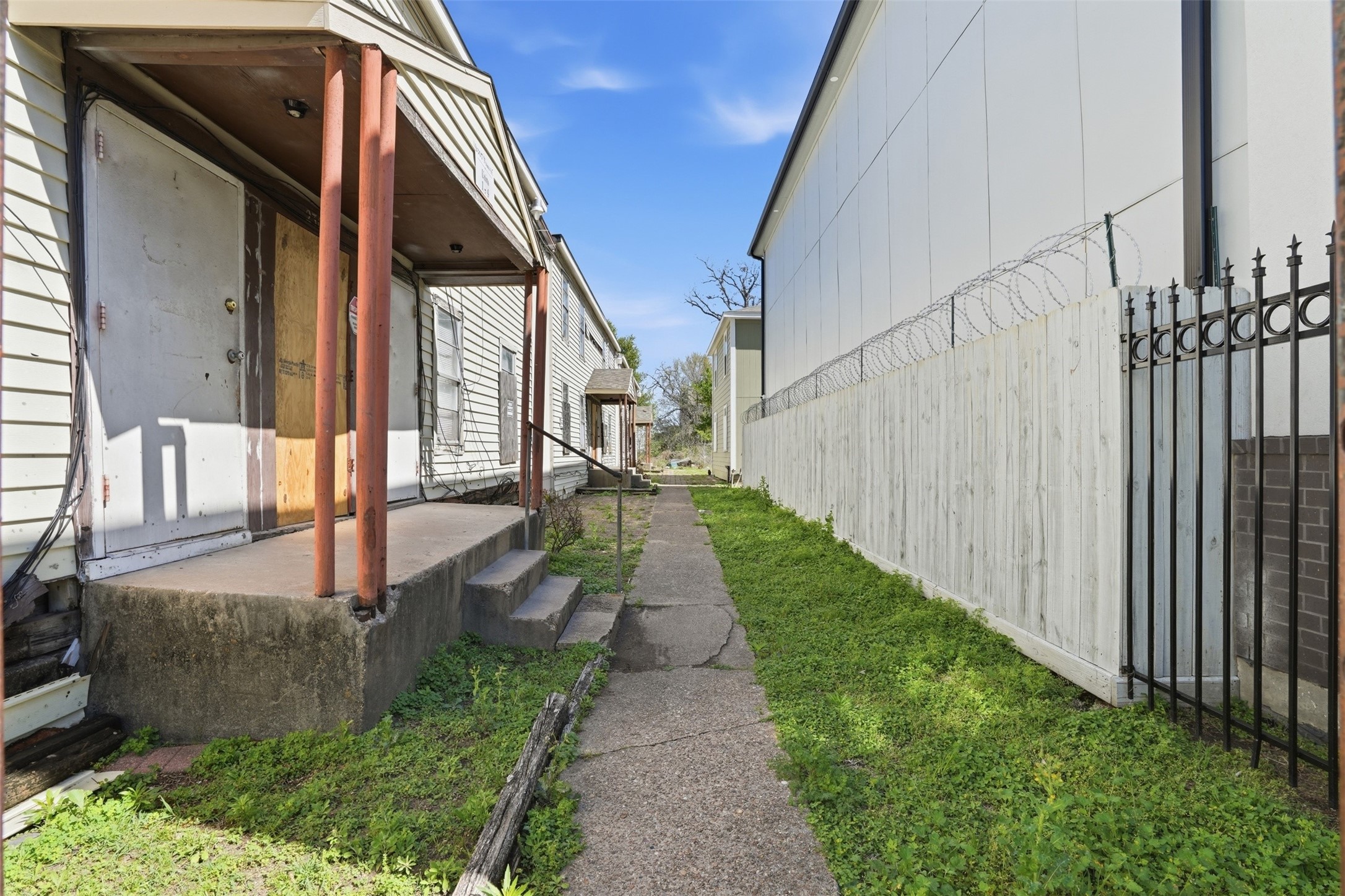 2307 Tuam Street Houston, TX 77004 - Photo 11 of 16 a view of house with backyard and patio