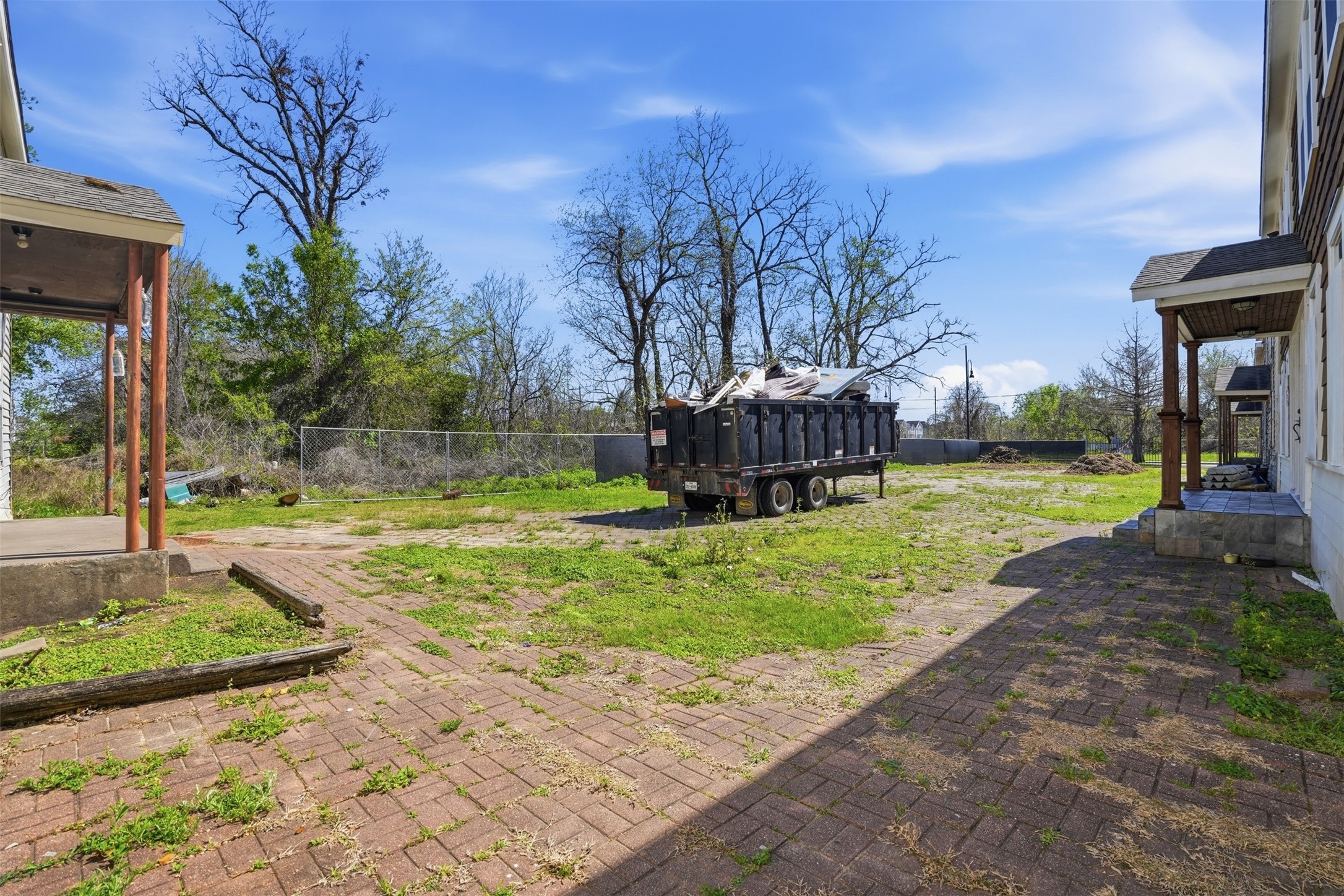 2307 Tuam Street Houston, TX 77004 - Photo 14 of 16 a view of a garden with a bench