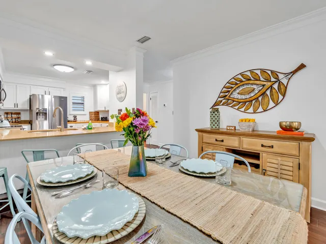 a living room with furniture a rug and a window