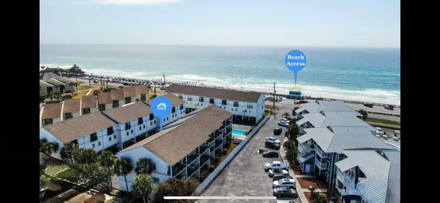 a view of a balcony with an ocean
