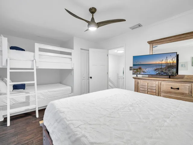 a bathroom with a sink a toilet and a shower