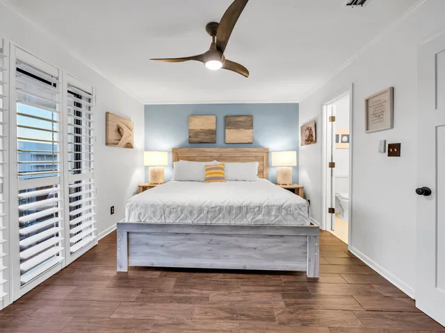 a bathroom with a sink a mirror and shower