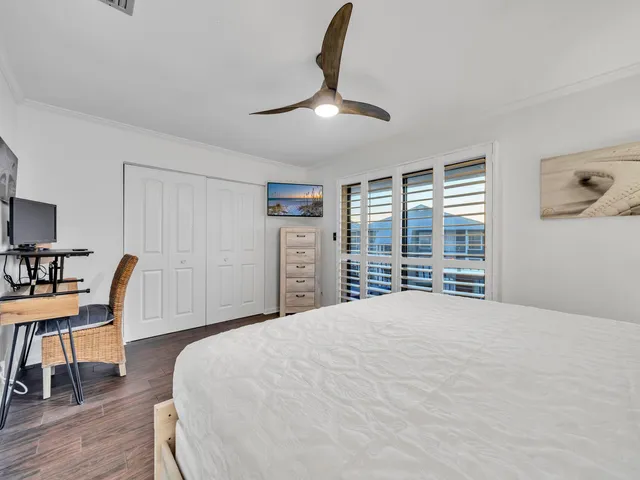 a balcony with a table and chairs