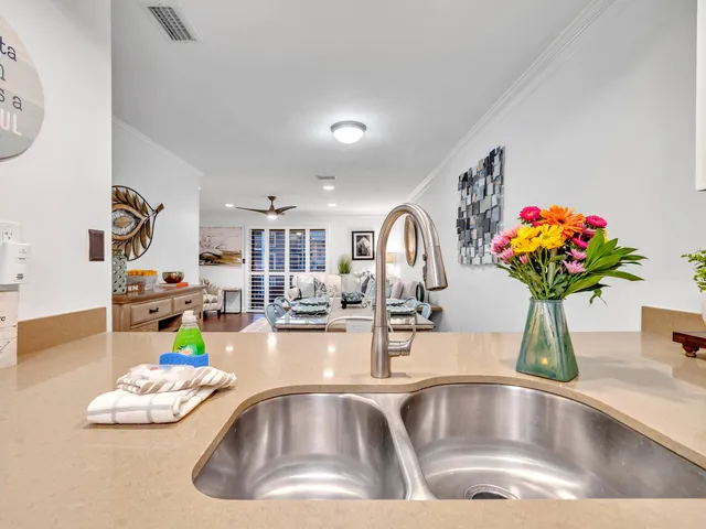 wooden floor with white walls and a window