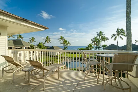 a view of balcony with furniture