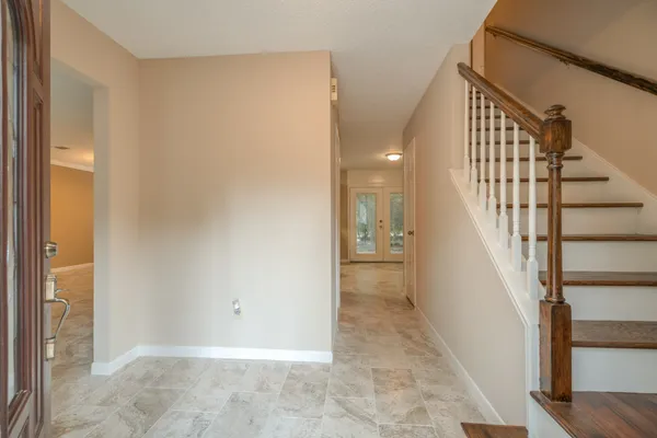 a view of an entryway with staircase