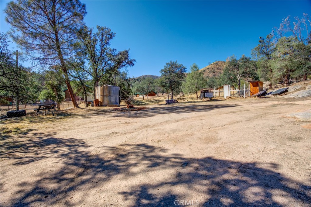 245 Mountain Shadow Road Wofford Heights, CA 93285 - Photo 44 of 72 a view of road with trees