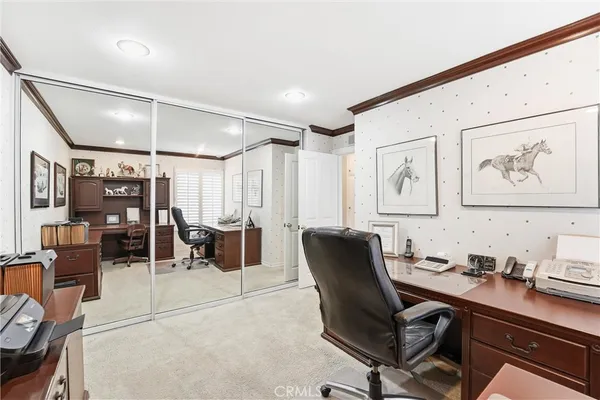 a work room with chairs and furniture