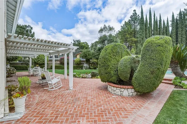 a view of a patio with sitting area