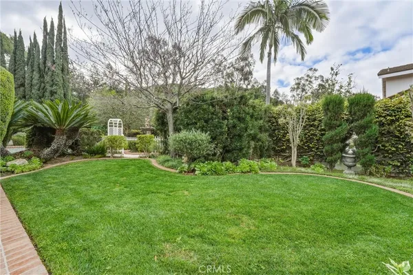 a view of a backyard with a garden