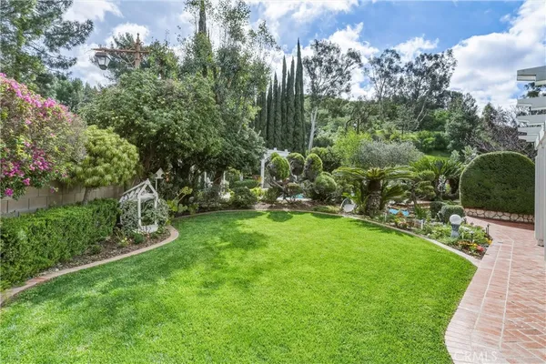 a garden view with a sitting space