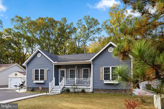 a vase of flowers sitting on a table