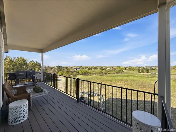 a view of a balcony with lake view and mountain view