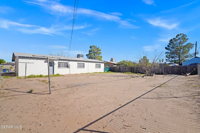 a view of a house with a street