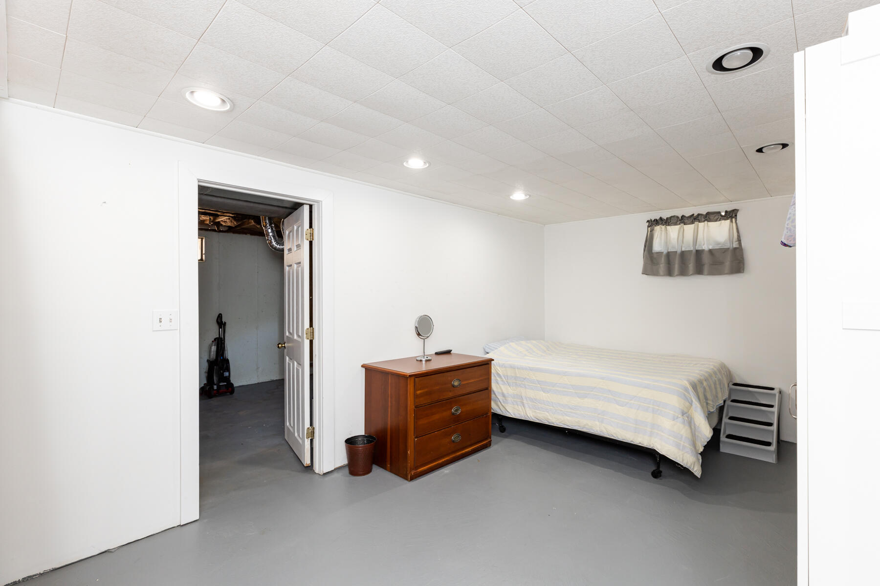 452 Lincoln Rd Extension Hyannis, MA 02601 - Photo 21 of 25 a room with a bed and a night stand