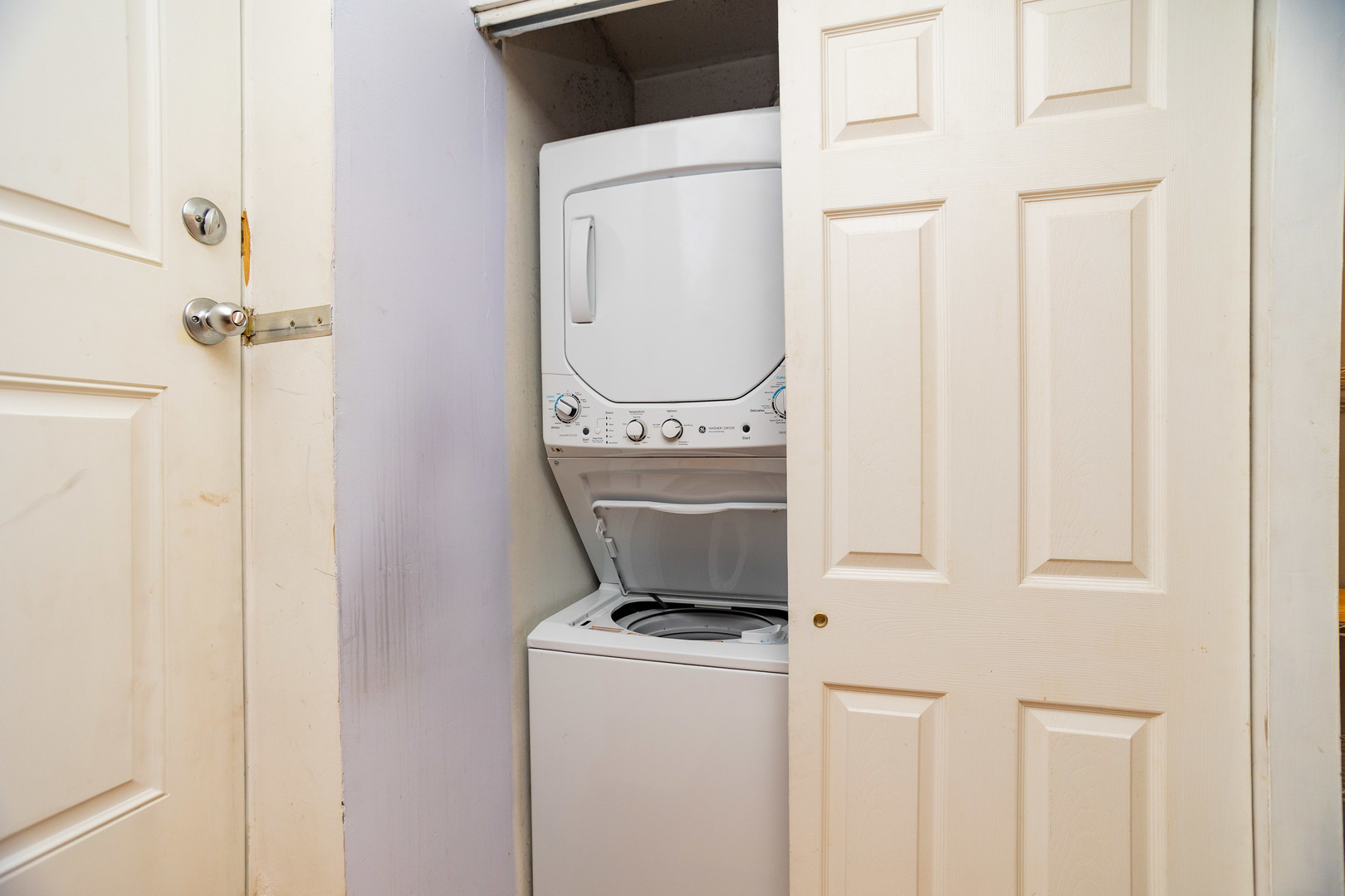 5745 North Ridge Avenue, Unit G Chicago, IL 60660 - Photo 14 of 16 a utility room with dryer and washer