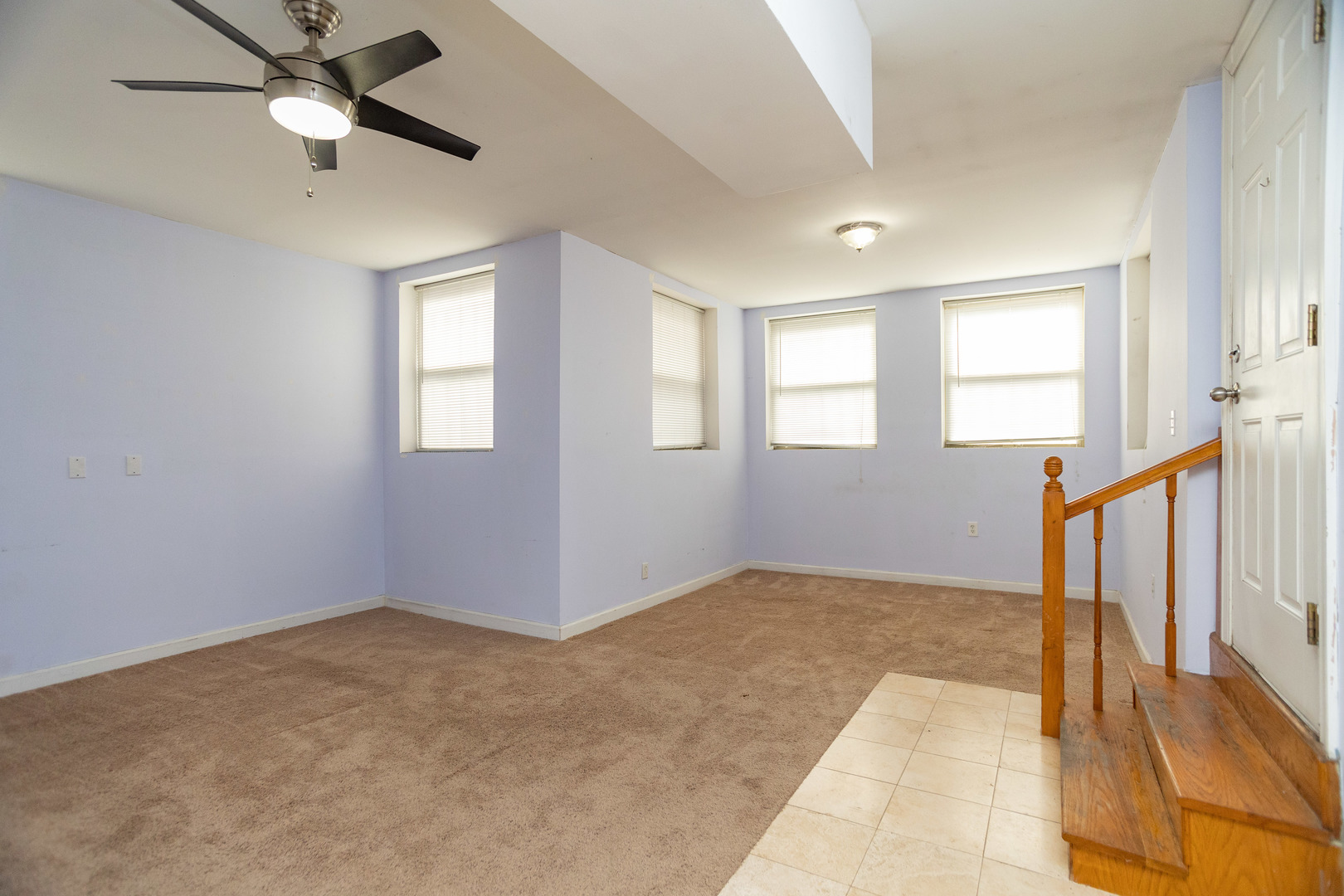 5745 North Ridge Avenue, Unit G Chicago, IL 60660 - Photo 4 of 16 a view of an empty room with a window