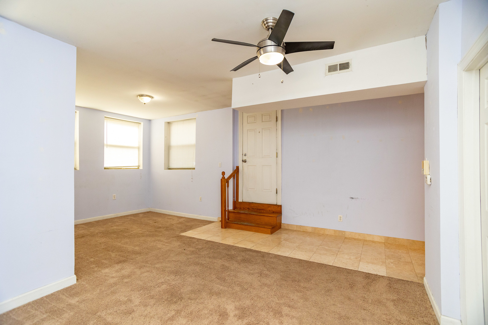 5745 North Ridge Avenue, Unit G Chicago, IL 60660 - Photo 5 of 16 a view of a room with a ceiling fan