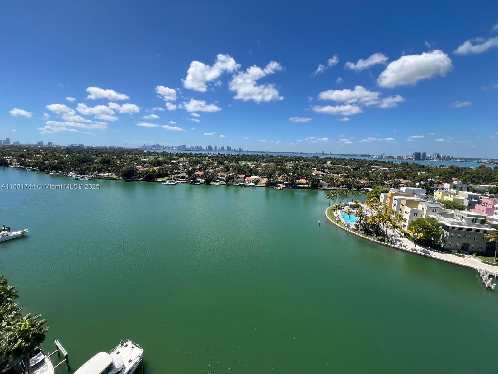 5900 Collins Avenue, Unit 1505 Miami Beach, FL 33140 - Photo 3 of 18 a view of a lake with a city